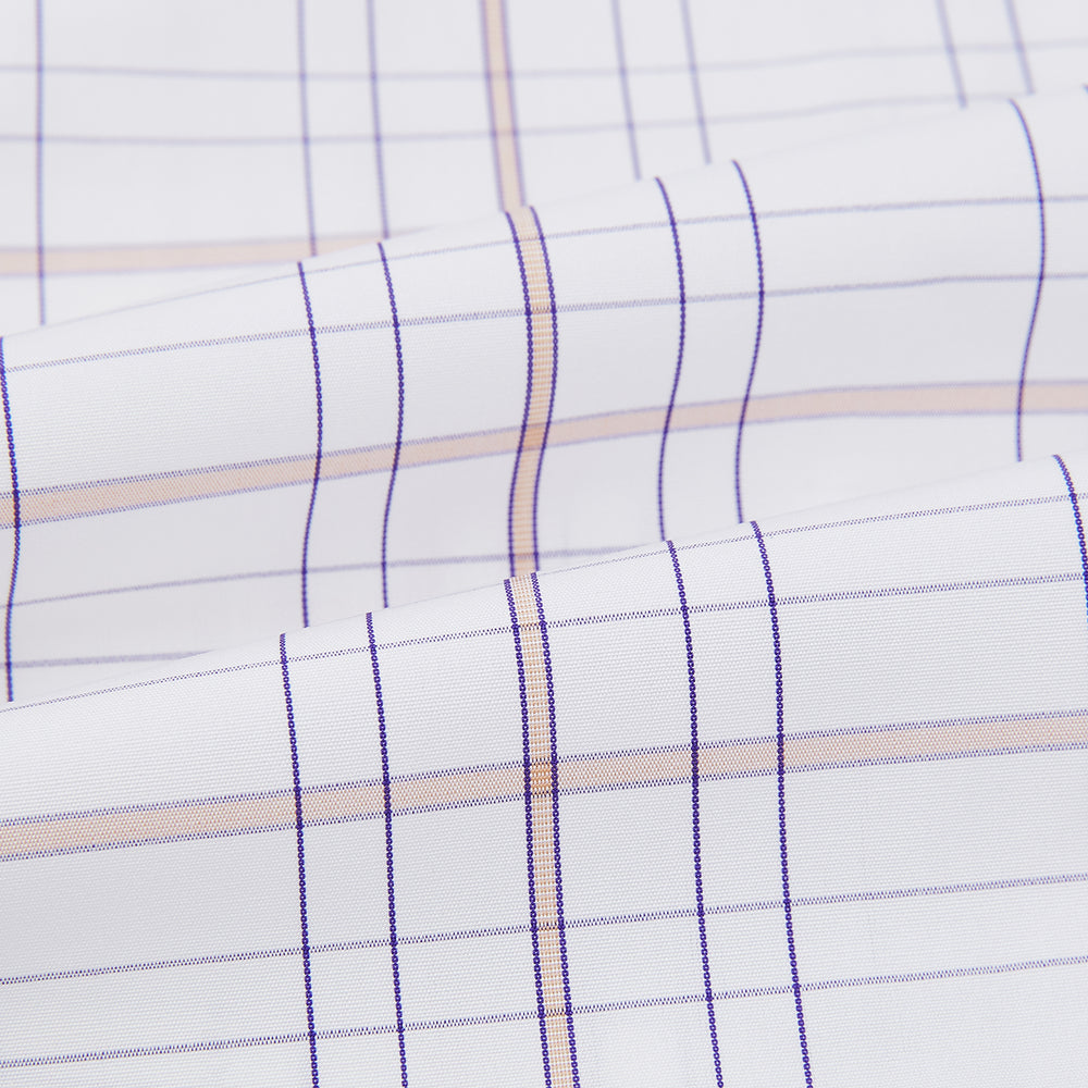 The Turnbull & Asser Purple Multi Plaid Check Shirt features a spread collar, double cuffs, and a fitted silhouette. Its bold plaid pattern and contrast collar add a modern touch to classic British style. Displayed on a plain white background.