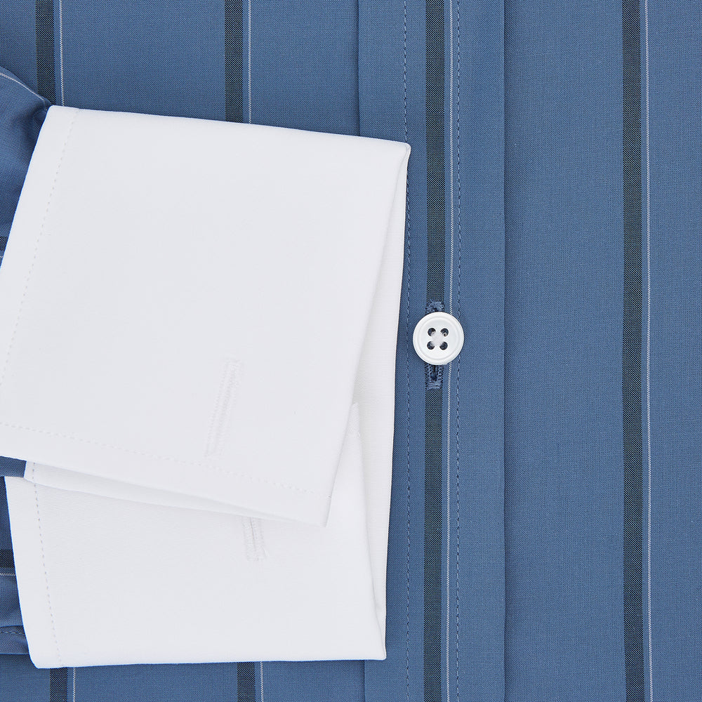 The Turnbull & Asser Steel Grey Track Stripe Shirt features vertical black stripes, a contrast white T&A collar, and white cuffs, shown against a plain light background.