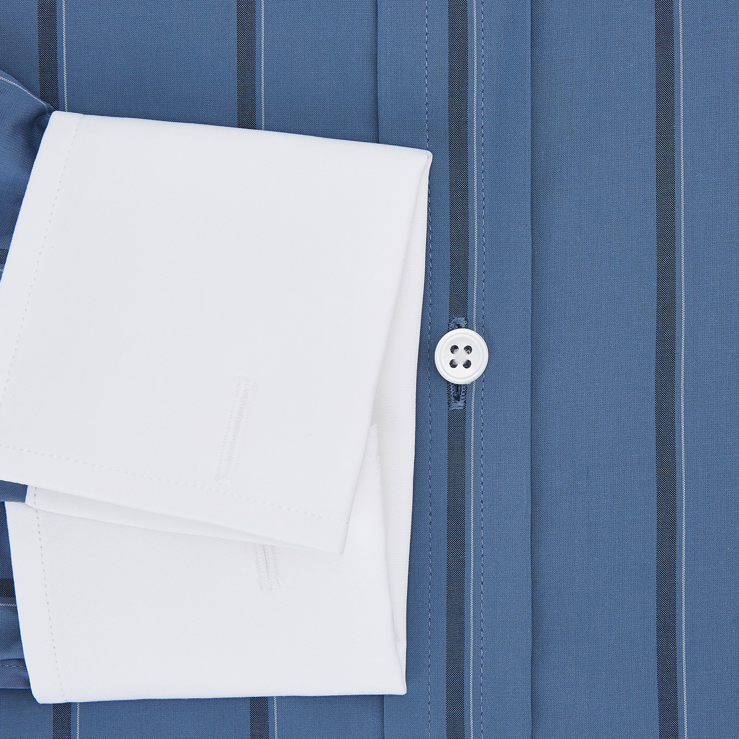 View 4 of product The Turnbull & Asser Steel Grey Track Stripe Shirt features vertical black stripes, a contrast white T&A collar, and white cuffs, shown against a plain light background.