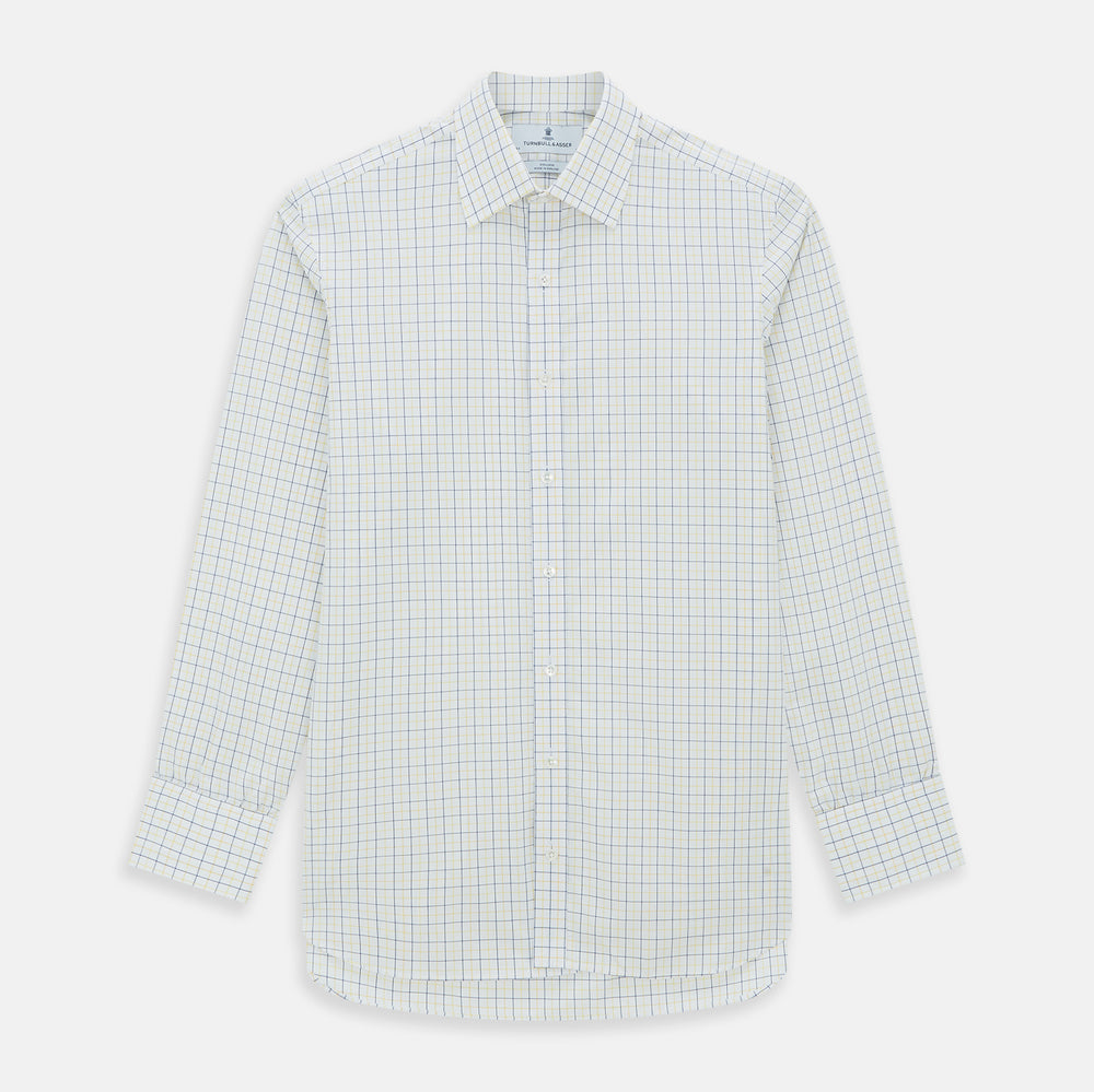 The Turnbull & Asser Yellow Overlay Grid Check Mayfair Shirt is a long-sleeve, button-down shirt made from soft organic cotton, featuring a yellow grid check pattern and shown laid flat on a white background.