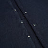 View 7 of product The Navy Linen Windsor Shirt by Turnbull & Asser features long sleeves, white buttons, a Turnbull collar, and buttoned cuffs in dark navy blue linen. Shown laid flat on a white background.