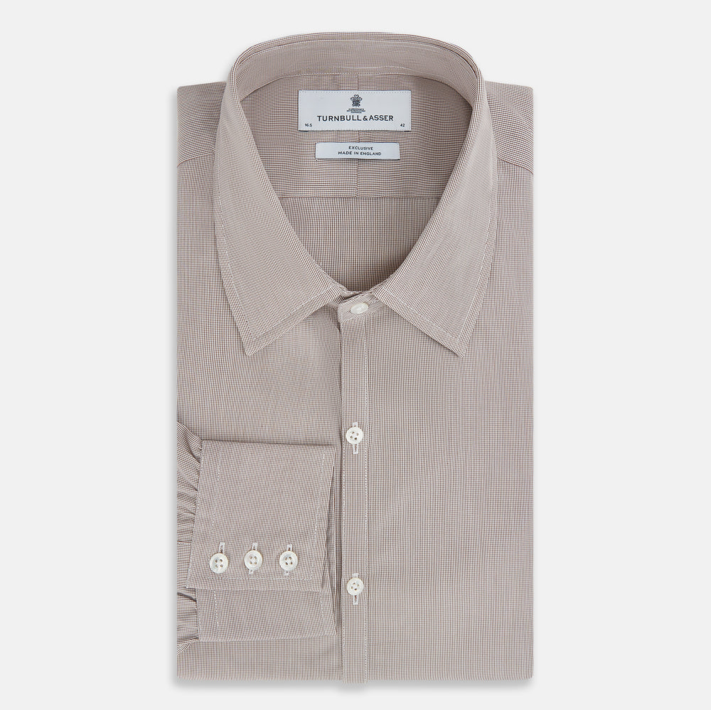 The Turnbull & Asser Brown Micro Graph Check Westminster shirt features long sleeves, a pointed collar, and buttoned cuffs—showcasing British craftsmanship and displayed flat on a white background.