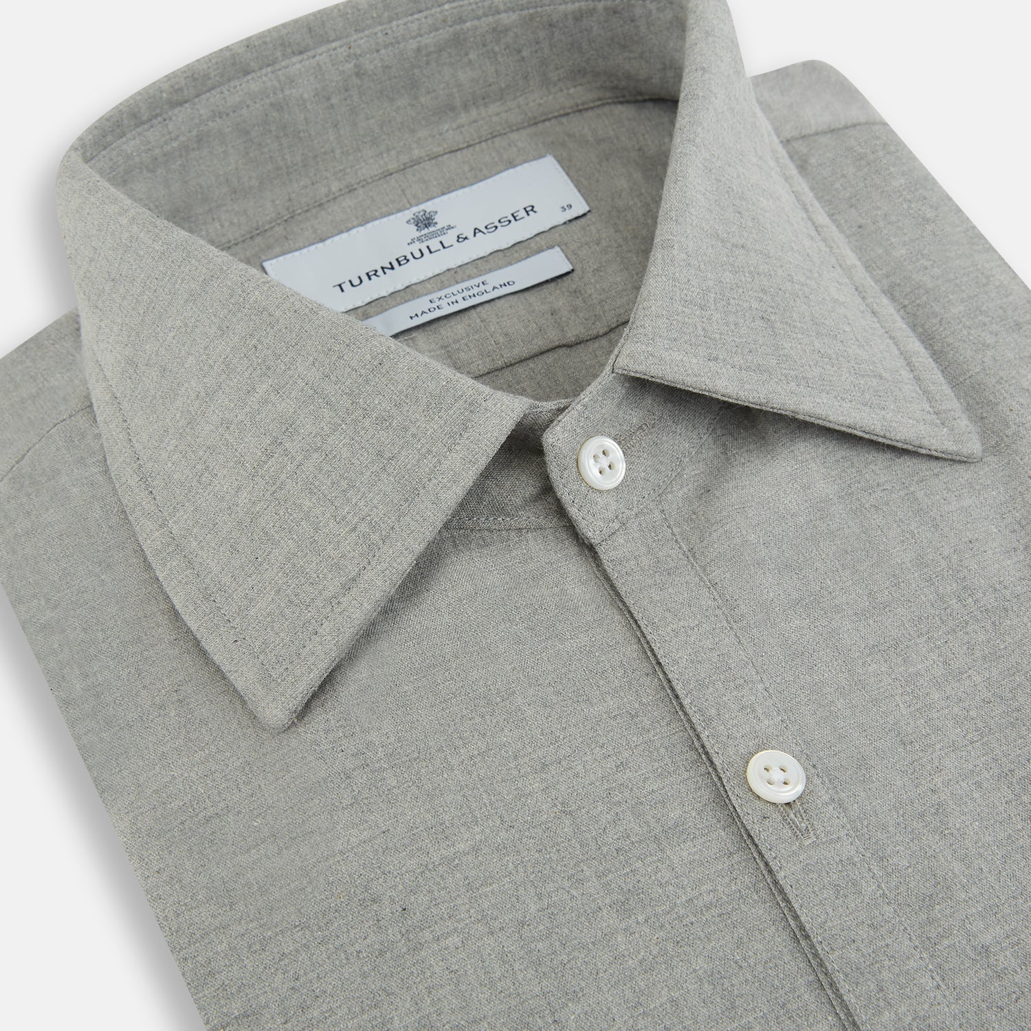 View 2 of product The Grey Westminster Shirt by Turnbull & Asser features a classic collar and white buttons, expertly crafted in Britain. This long-sleeve button-up is shown against a plain white background.