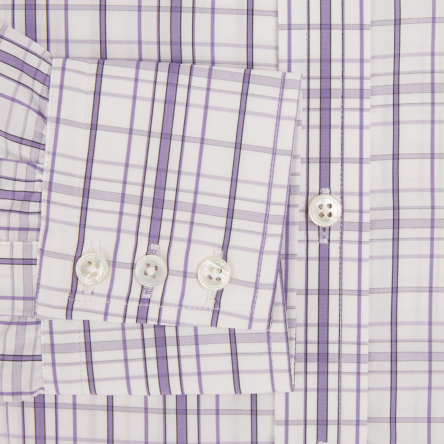 View 4 of product The Turnbull & Asser Purple Plaid Check Mayfair Shirt is a long-sleeve button-down with a pointed T&A collar, featuring a purple and blue plaid pattern on white.