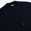 View 2 of product The Navy V-Neck Cashmere Cardigan by Turnbull & Asser features a button-up front, ribbed cuffs and hem, and two front pockets—a classic from our knitwear collection.