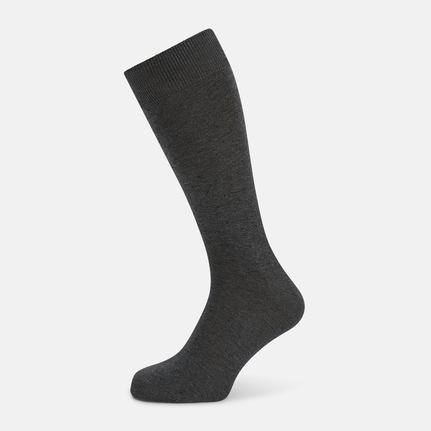 View 1 of product The image shows a single Turnbull & Asser Dark Steel/Navy Polka Dot Mid-Length Sock standing upright on a plain white background, featuring a ribbed cuff and a smooth, seamless finish.