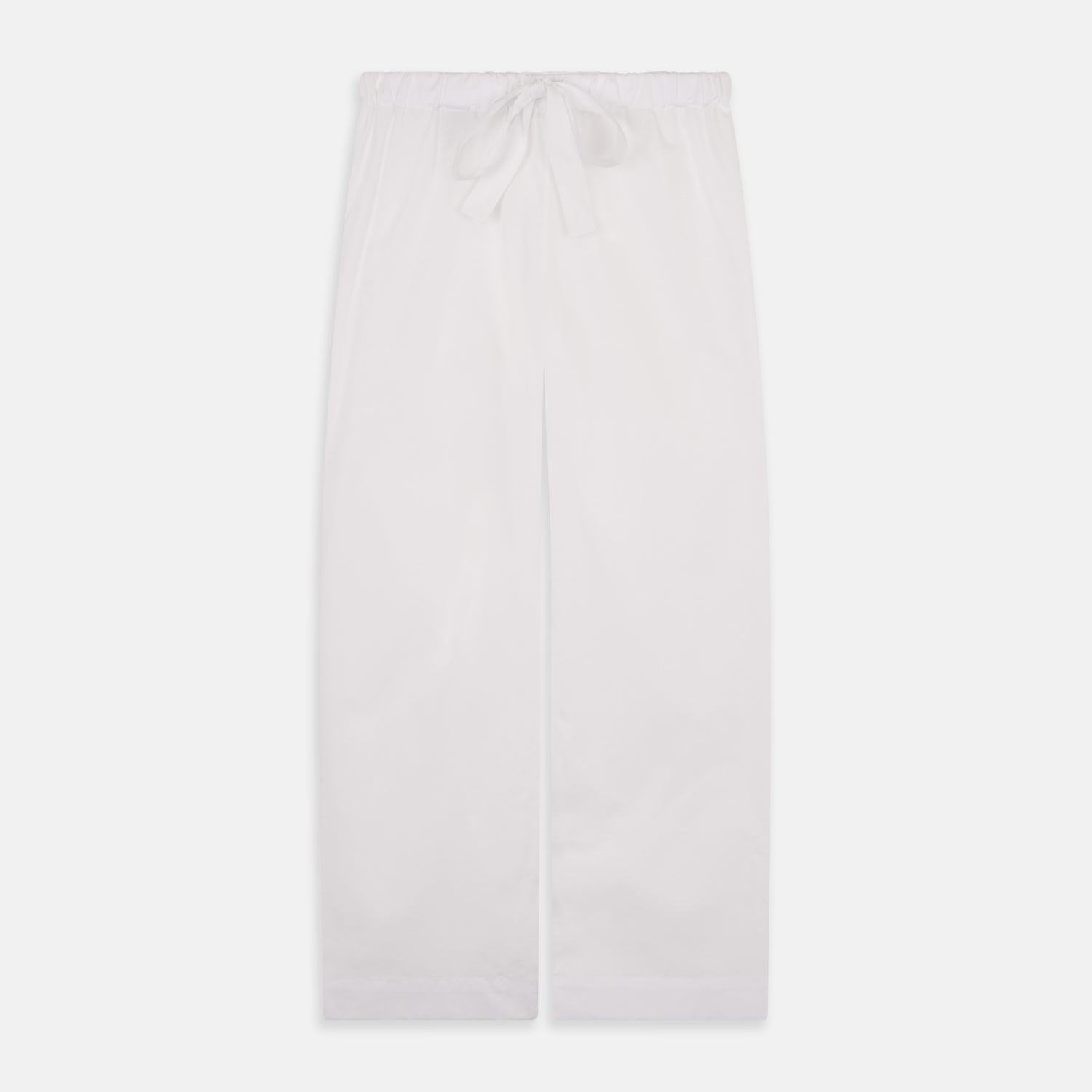 View 5 of product The Turnbull & Asser Women's Harriet Plain White Cotton Pyjama Set features long sleeves, black piping, a chest pocket, and matching pants with elastic waistband and ribbon tie, all displayed on a white background.