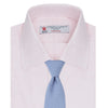 View 4 of product The Turnbull & Asser Pink Herringbone Superfine Cotton Shirt features a T&A collar, double cuffs, and clean-cut design, displayed neatly folded against a white background.