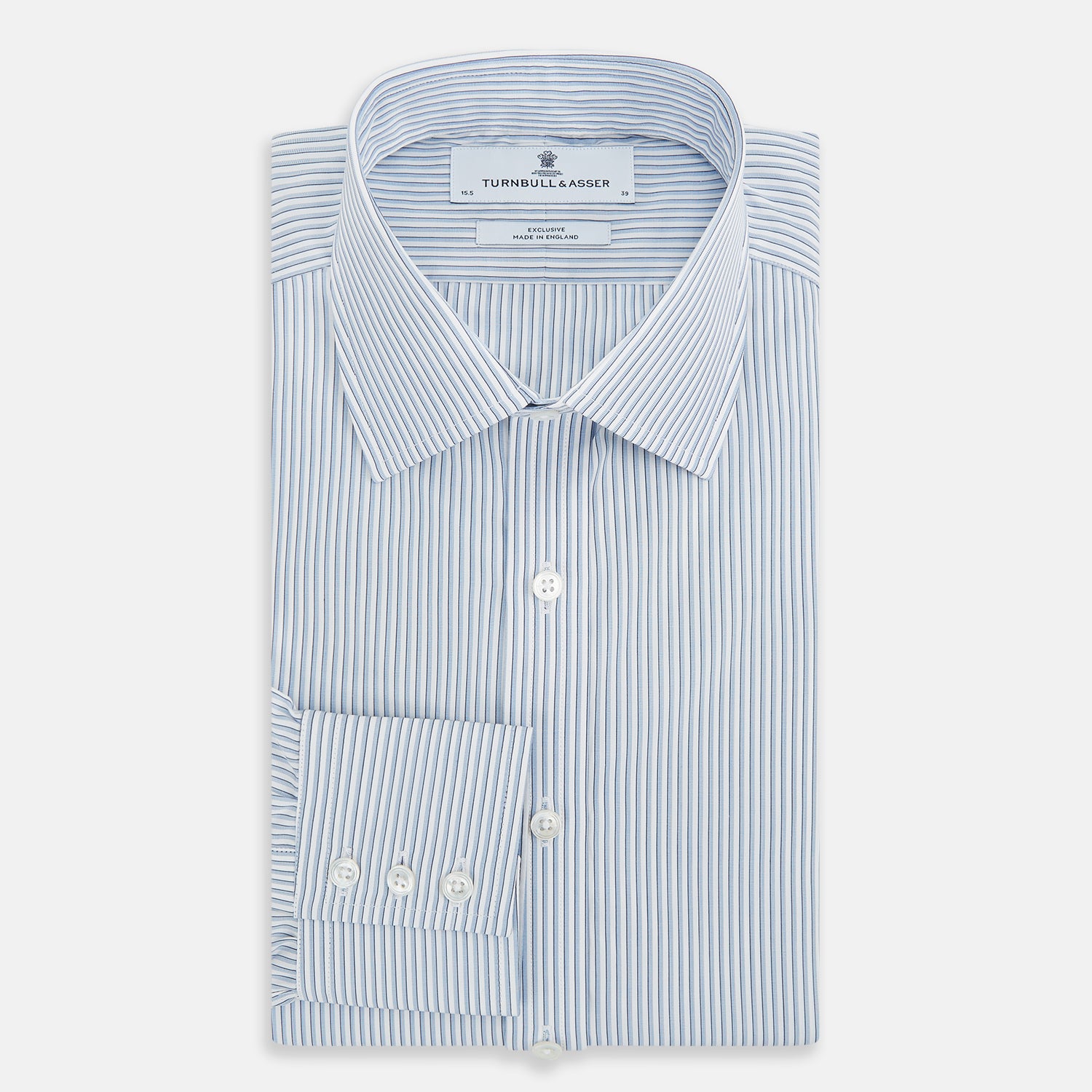 View 5 of product The Turnbull & Asser Sky Blue Shadow Pinstripe Mayfair Shirt, a long-sleeved, button-up shirt with a T&A collar and light blue and white thin vertical stripes, is displayed flat on a white background.