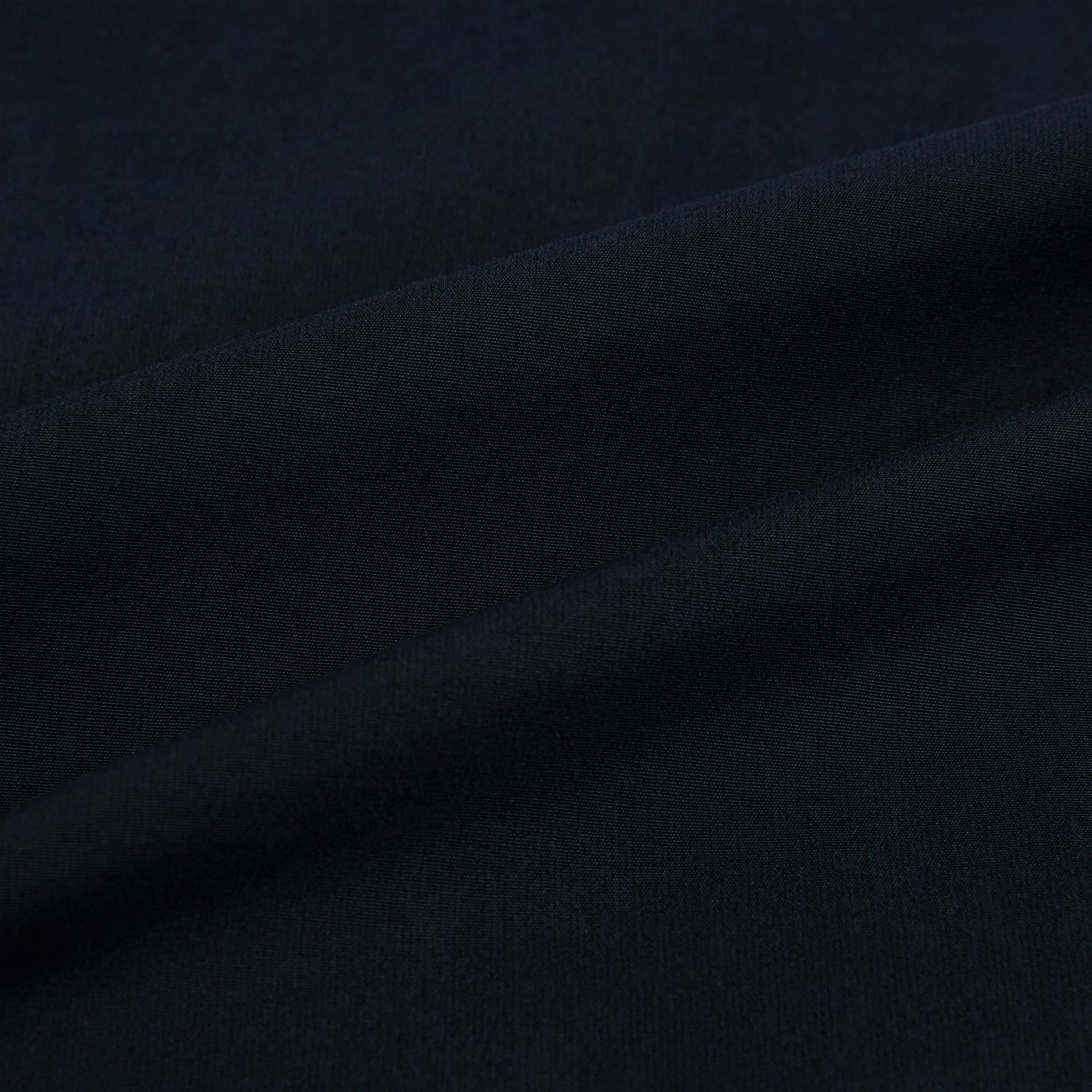 View 8 of product The DARK NAVY WINDSOR SHIRT by Turnbull & Asser is a long-sleeve shirt with a refined Windsor collar, showcasing classic British craftsmanship.