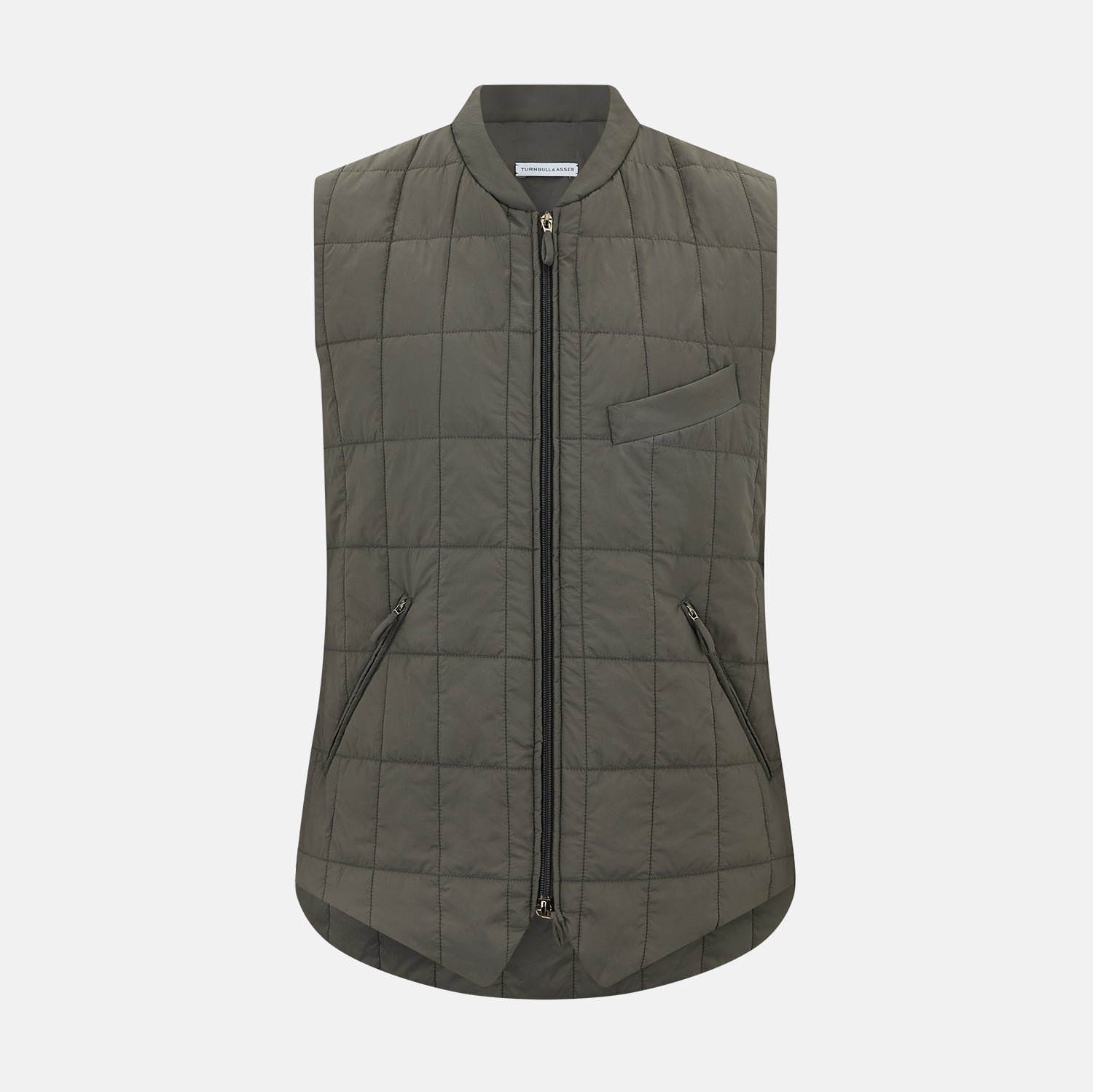 View 1 of product The Shadow Grey Quilted Gilet by Turnbull & Asser is a sleeveless, lightweight layer featuring a front zipper, two zippered side pockets, one chest pocket, and a rounded hem—shown on a plain white background.