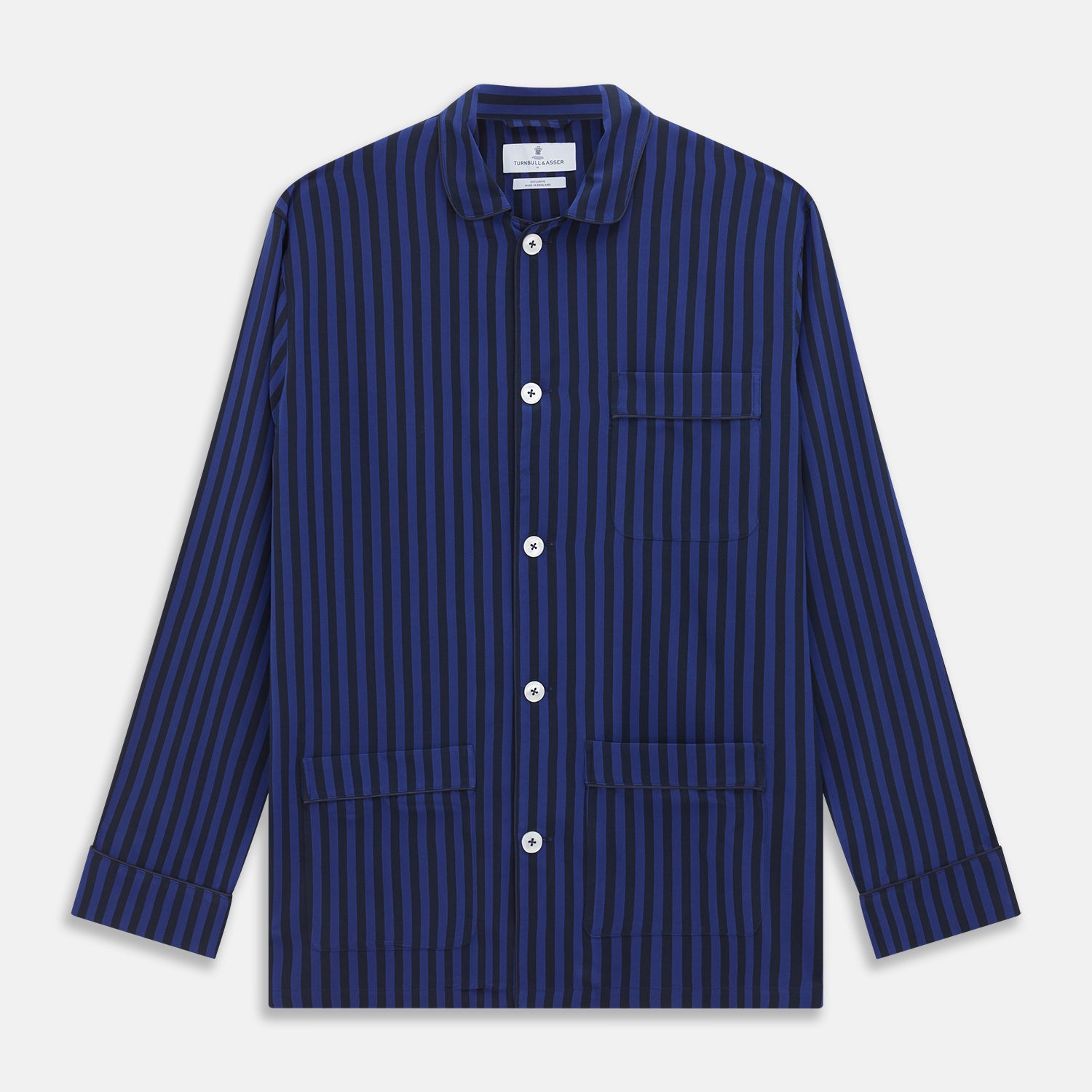 View 5 of product The Turnbull & Asser Blue and Navy Candy Stripe Silk Hyde Pyjamas Set features a long-sleeve button-up top with a chest pocket and elastic-waist pants, shown on a plain white background.
