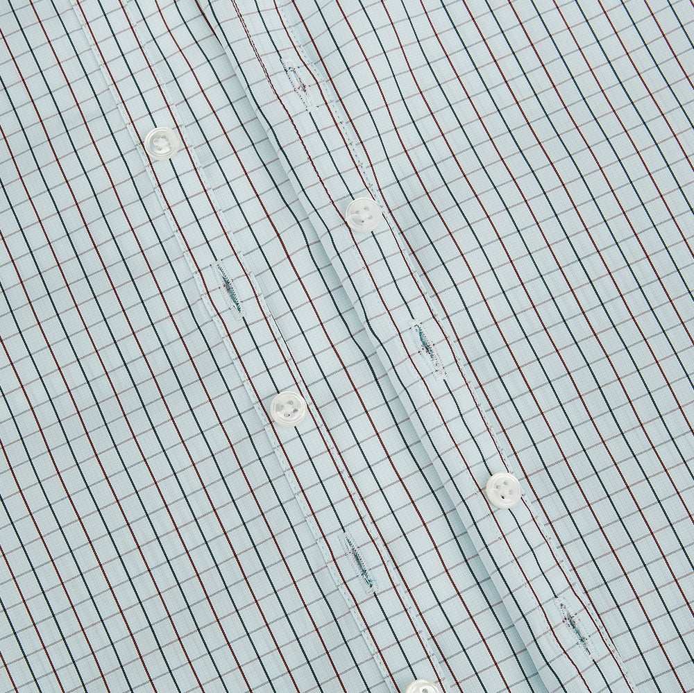 The Turnbull & Asser Forest Melange and Red Overlay Grid Check Westminster Shirt features long sleeves, a pointed collar, and buttoned cuffs, highlighting British craftsmanship. It's shown laid flat against a white background.