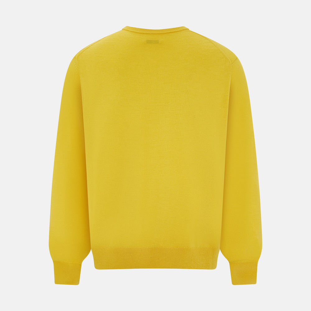 The Turnbull & Asser Canary Yellow Fine Merino V-Neck Jumper, crafted from soft knitwear, features long sleeves and is displayed on a white background.