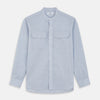View 1 of product Turnbull & Asser’s Pale Blue Linen Blend Weekend Fit Unwin Shirt features long sleeves, a band collar, two chest pockets, and white buttons—ideal for casual summer wear.