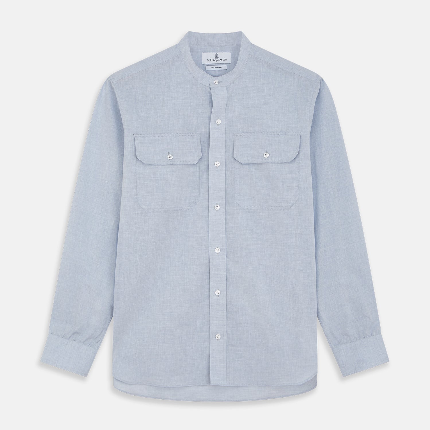 View 1 of product Turnbull & Asser’s Pale Blue Linen Blend Weekend Fit Unwin Shirt features long sleeves, a band collar, two chest pockets, and white buttons—ideal for casual summer wear.