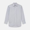 View 1 of product The Turnbull & Asser Faded Blue Block Check Cotton Regular Fit Mayfair Shirt, featuring long sleeves, a classic collar, and white buttons, is neatly laid flat on a white background.
