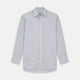 The Turnbull & Asser Faded Blue Block Check Cotton Regular Fit Mayfair Shirt, featuring long sleeves, a classic collar, and white buttons, is neatly laid flat on a white background.
