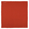 View 2 of product The Orange Spot Silk Pocket Square by Turnbull & Asser features evenly spaced white polka dots and the brand’s name in one corner, making this dapper accessory a standout addition to any outfit.