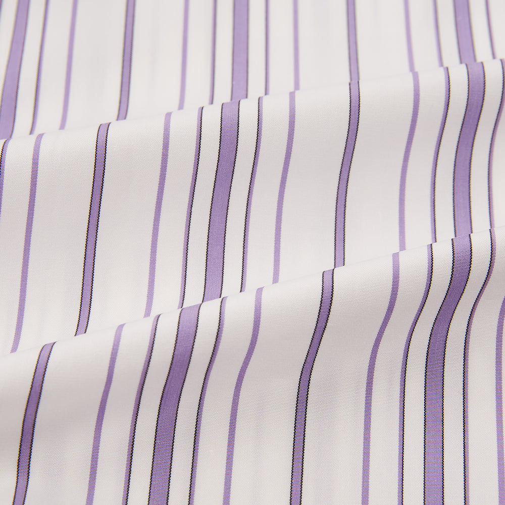 The Purple Multi Stripe Mayfair Shirt by Turnbull & Asser is a long-sleeve, collared button-up featuring vertical blue and purple stripes on white, ideal for formal occasions. The shirt is neatly displayed flat against a white background.