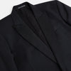 View 2 of product The Turnbull & Asser Black Single Breasted Dinner Suit features fine wool, a satin shawl collar jacket, and matching trousers—perfect formal wear, shown on a plain white background.