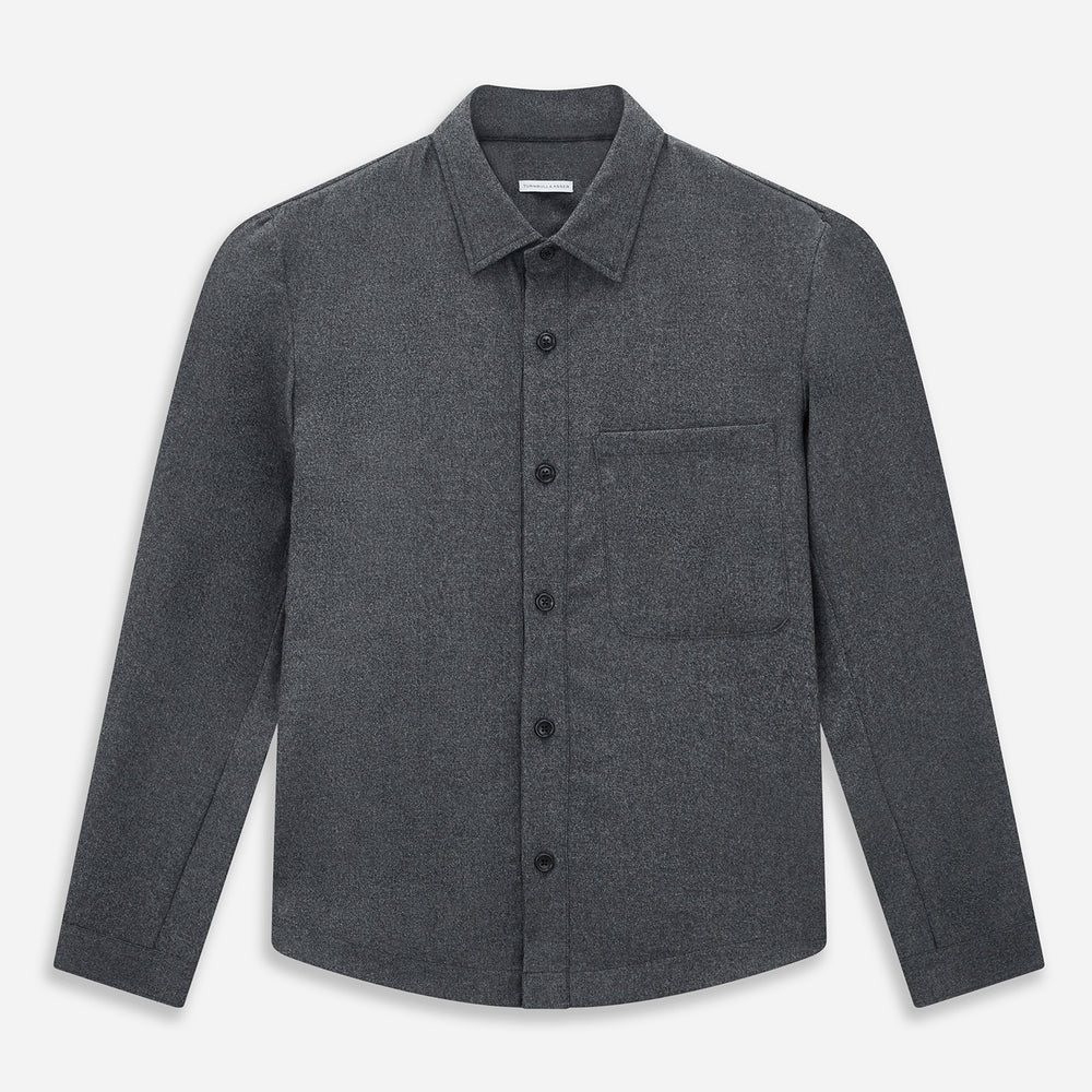 The Grey Highbury Overshirt by Turnbull & Asser is a long-sleeve, button-up charcoal gray overshirt with a single chest pocket, inspired by classic formal jackets and shown laid flat on a white background.