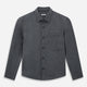 The Grey Highbury Overshirt by Turnbull & Asser is a long-sleeve, button-up charcoal gray overshirt with a single chest pocket, inspired by classic formal jackets and shown laid flat on a white background.