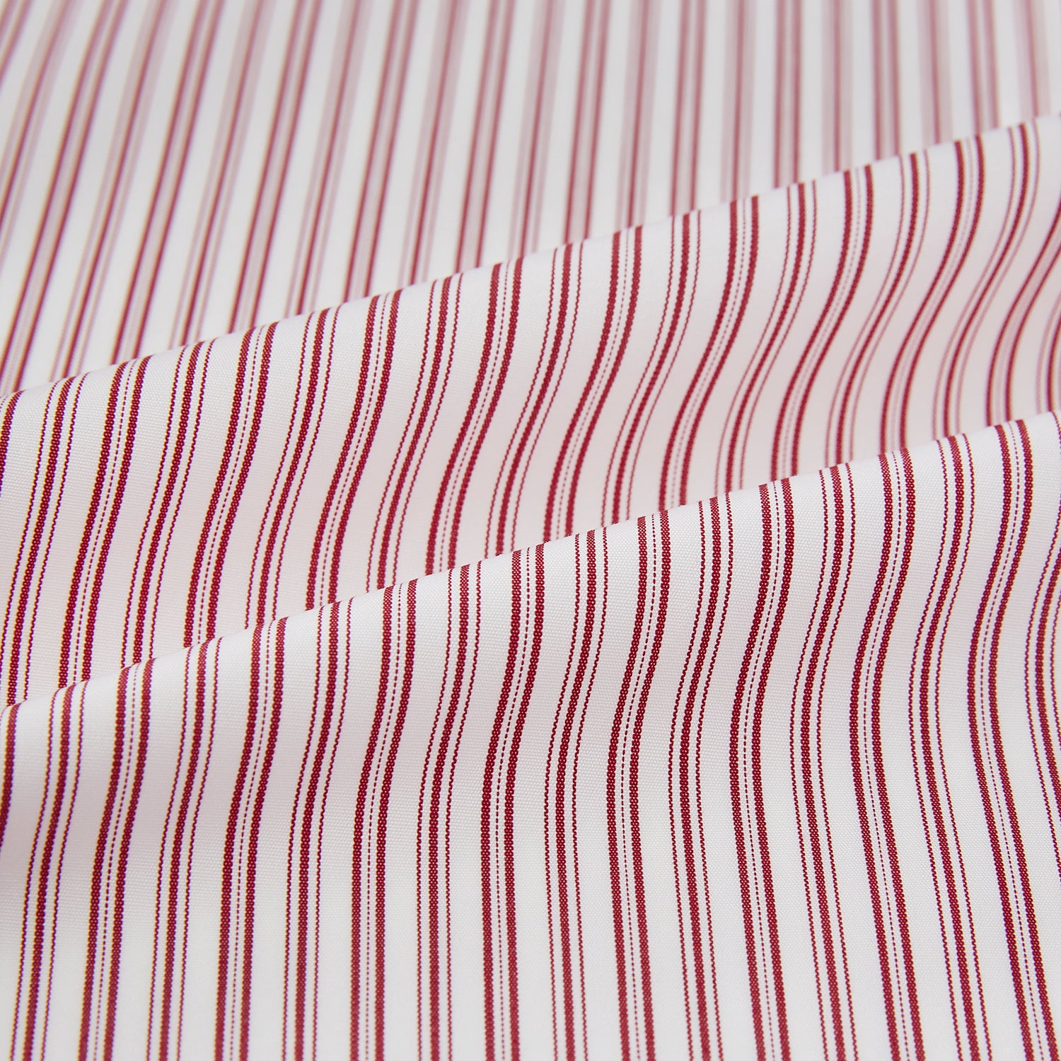 View 8 of product The Red Ticking Stripe Westminster Shirt by Turnbull & Asser features long sleeves, a button-up front, and vertical red and white stripes, shown flat on a white background.
