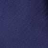 View 2 of product The PLAIN HERRINGBONE NAVY TIE by Turnbull & Asser, crafted from silk with a subtle pattern, is elegantly rolled and displayed against a plain white background.