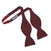 View 3 of product The Turnbull & Asser Burgundy and White Small Spot Printed Silk Bow Tie is shown on a plain white background.