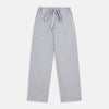 View 5 of product The Turnbull & Asser Pale Blue Multi Stripe Cotton Quin Pyjamas, featuring a long-sleeve button-up top and matching adjustable tie-waist pants, are neatly arranged on a white background.