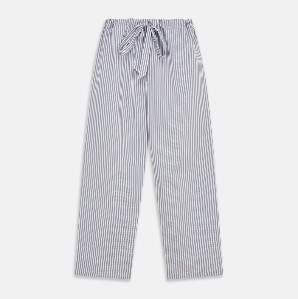 The Turnbull & Asser Pale Blue Multi Stripe Cotton Quin Pyjamas, featuring a long-sleeve button-up top and matching adjustable tie-waist pants, are neatly arranged on a white background.