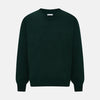 View 1 of product The Turnbull & Asser Forest Green Fine Merino V-Neck Jumper features long sleeves, ribbed cuffs and hem—classic knitwear for any wardrobe, shown on a white background.