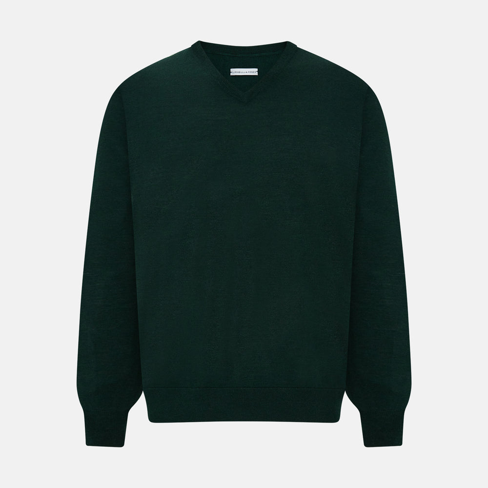 The Turnbull & Asser Forest Green Fine Merino V-Neck Jumper features long sleeves, ribbed cuffs and hem—classic knitwear for any wardrobe, shown on a white background.