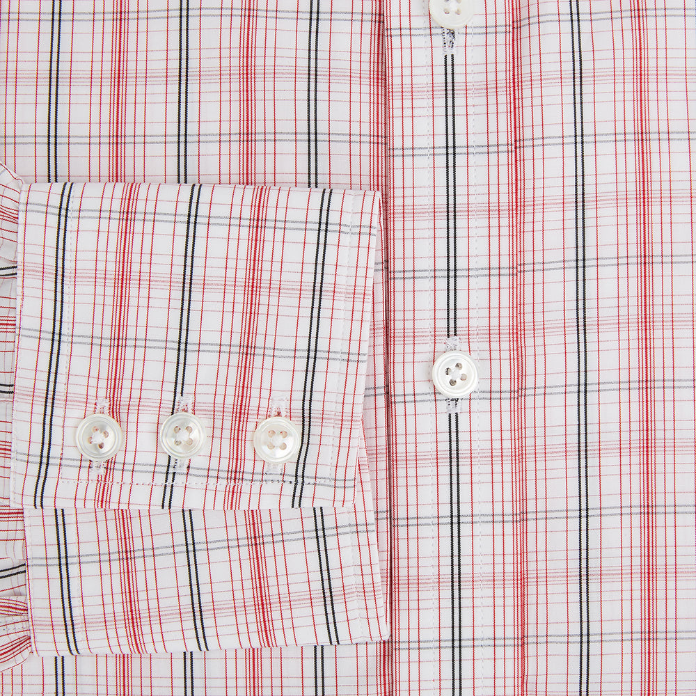 The Turnbull & Asser Red Multi Check Mayfair Shirt is a long-sleeve, button-up with a collar, crafted from Italian cotton and featuring a red multi check plaid pattern on white, shown laid flat against a white surface.