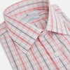 View 2 of product The Turnbull & Asser Red Multi Check Mayfair Shirt is a long-sleeve, button-up with a collar, crafted from Italian cotton and featuring a red multi check plaid pattern on white, shown laid flat against a white surface.