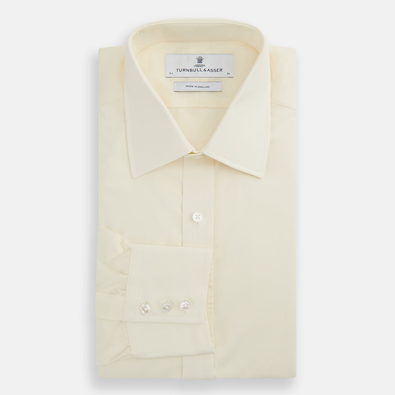 View 4 of product The Cream Cotton Shirt with T&A Collar and 3-Button Cuffs by Turnbull & Asser is ideal for minimalist styles or pairing with bold ties. Shown on a plain white background.