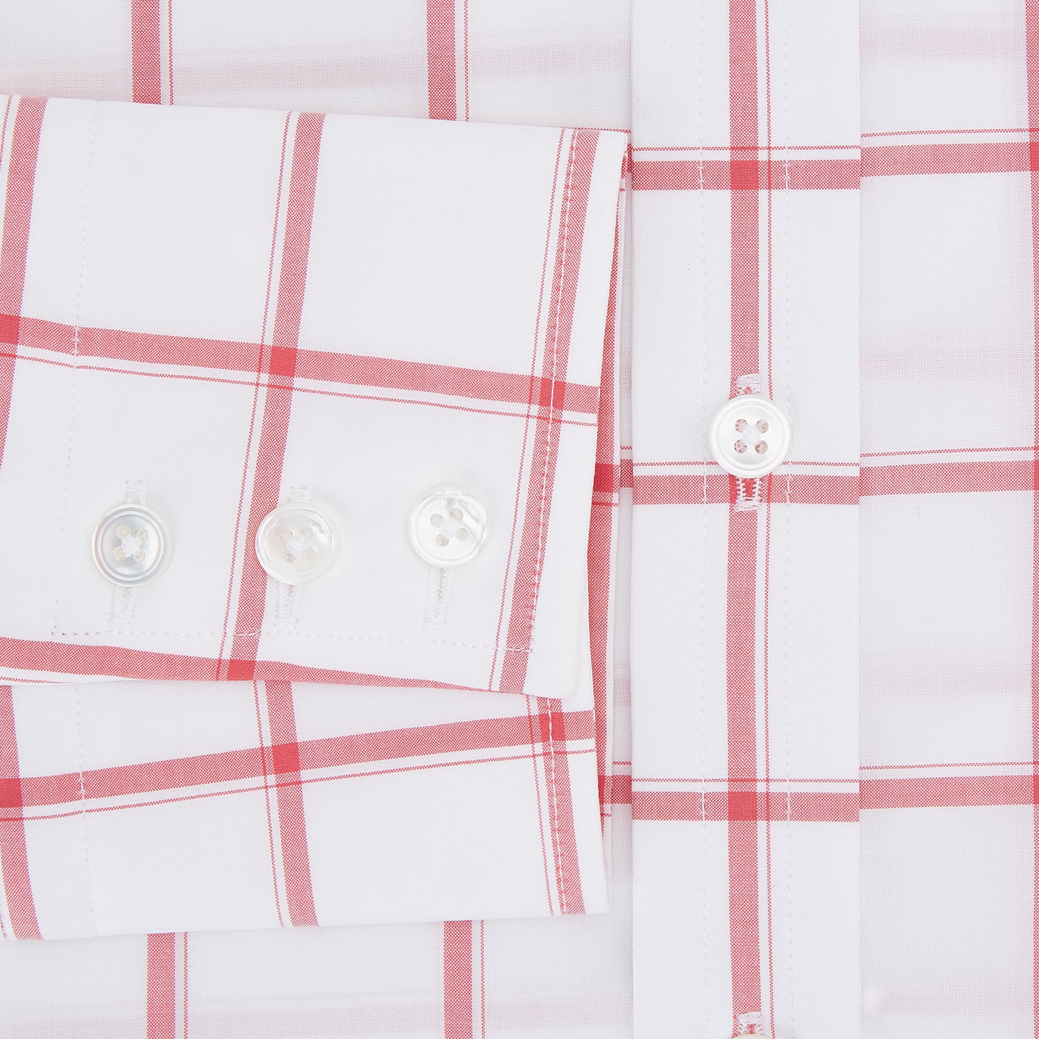 View 4 of product The Turnbull & Asser Coral Grid Check Mayfair Shirt is a white long-sleeve shirt with a collar, made from fine Italian cotton and featuring an evenly spaced coral grid check pattern.