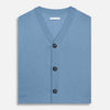 View 4 of product Turnbull & Asser’s Pale Blue Merino V-neck Sleeveless Cardigan features a button-up front, two pockets, and ribbed hem—a classic gentleman’s piece shown on a plain white background.