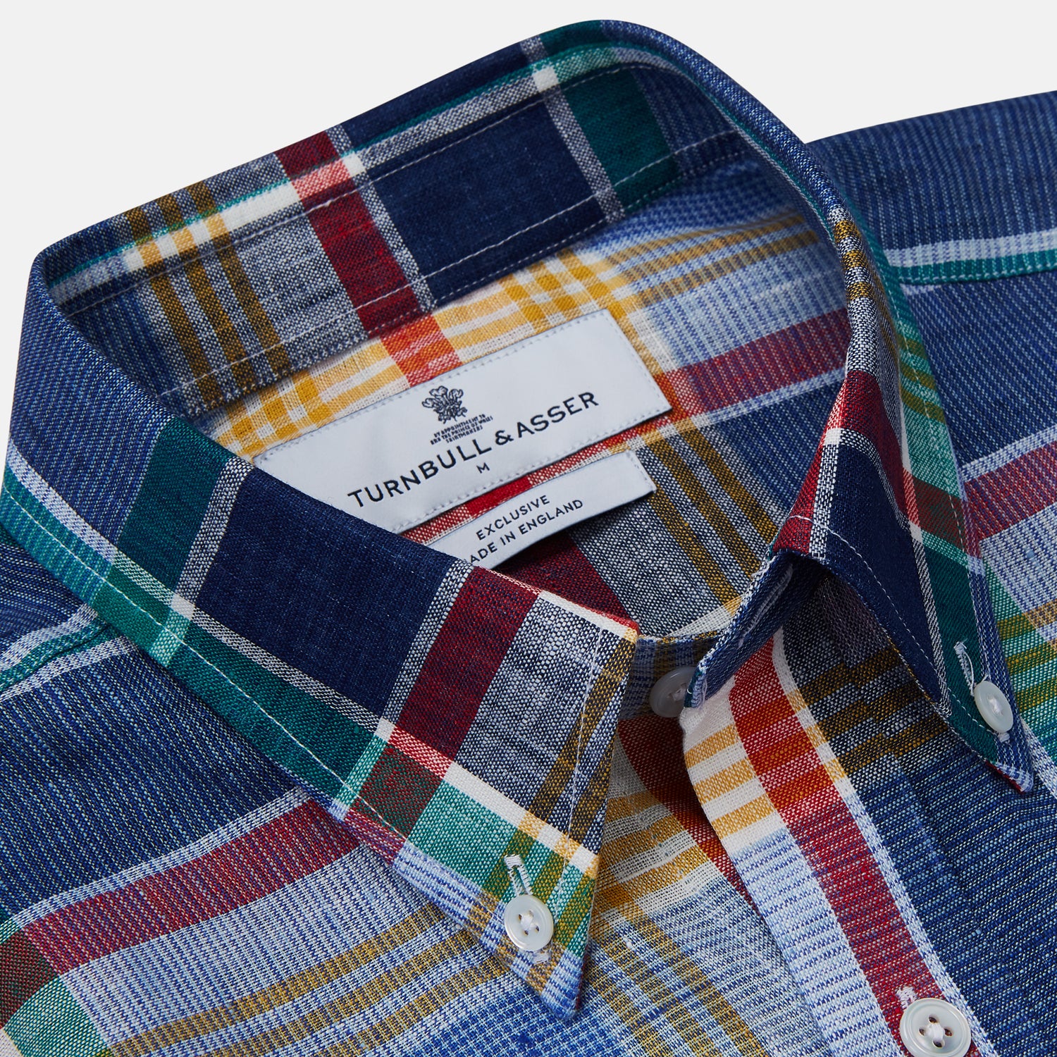 View 3 of product The Blue Multi Check Linen Weekend Fit Suffolk Shirt by Turnbull & Asser features a classic collar, white buttons, chest pocket, and colorful blue, green, yellow, red, and white plaid—perfect for a casual weekend look.