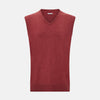 View 1 of product A refined piece from Turnbull & Asser, the Antique Pink Cashmere V-Neck Vest features a sleeveless design with a ribbed hem, shown against a plain white background.