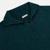 View 2 of product The Turnbull & Asser Hunter Green Half-Zip Cashmere Jumper is a classic knitwear pullover with long sleeves, a high mock neck, half-zip closure, and ribbed cuffs and hem, shown against a plain white background.