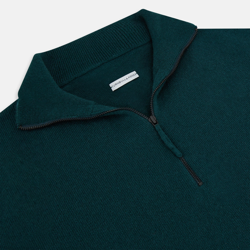The Turnbull & Asser Hunter Green Half-Zip Cashmere Jumper is a classic knitwear pullover with long sleeves, a high mock neck, half-zip closure, and ribbed cuffs and hem, shown against a plain white background.