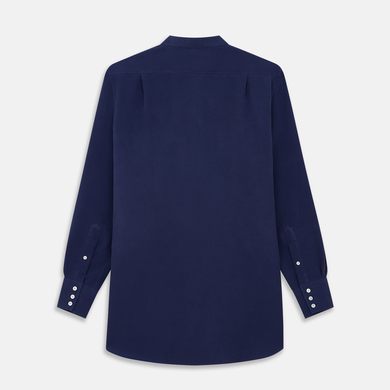 View 3 of product The Turnbull & Asser Blue Soft-touch Silk Lauren Shirt is a navy, long-sleeve button-up with an Igret stand collar, white buttons, curved hem, relaxed fit, and elongated body for a modern look, shown laid flat on a white background.