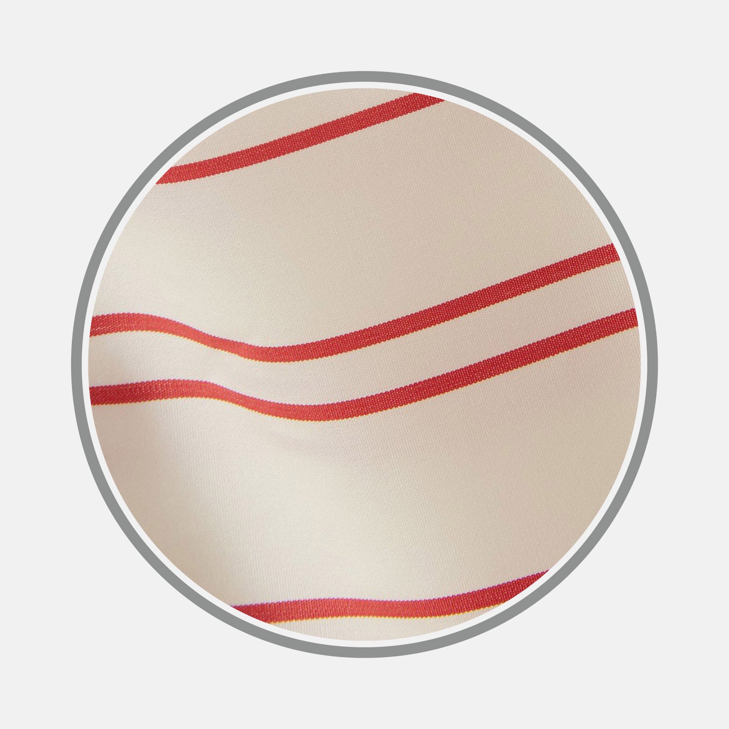View 1 of product Close-up of Turnbull & Asser's Red and Off-White Stripe Cotton Fabric, featuring diagonal stripes in red and orange on an off-white background, displayed within a circular gray border.