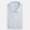 View 4 of product The Turnbull & Asser Blue Fine Multi Pinstripe Mayfair Shirt features long sleeves, an organic cotton build, a T&A collar, and vertical blue stripes. Laid neatly on a white background.