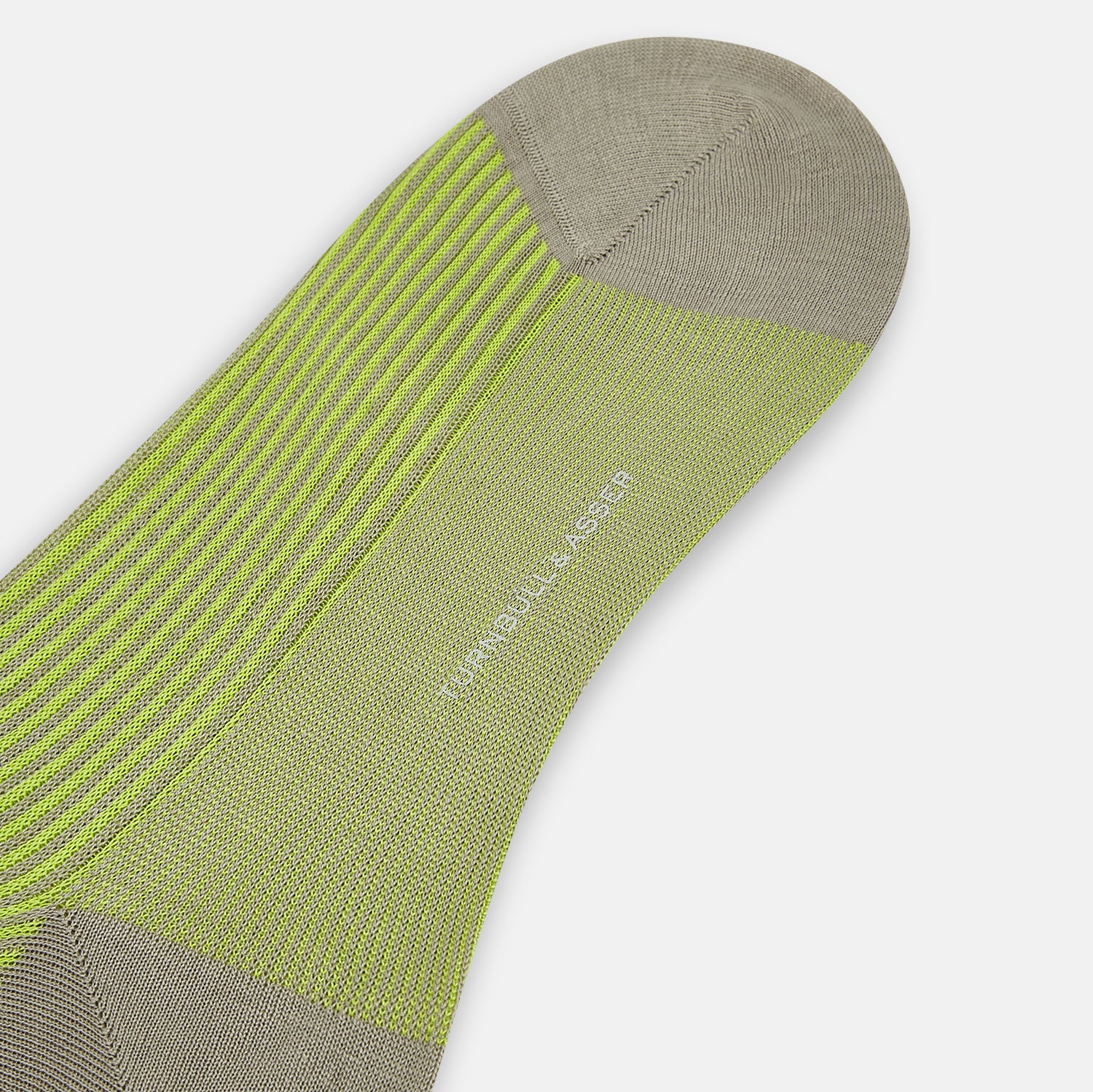 View 3 of product The Turnbull & Asser Lime/grey Thin Striped Long Socks are knee-high with green and yellow stripes and solid tan toe, heel, and cuff, shown against a plain light background.