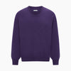 View 6 of product The Turnbull & Asser Purple Cashmere Round Neck Jumper features long sleeves, ribbed cuffs, hem, and collar for an elegant silhouette. This versatile knitwear piece is shown against a white background.