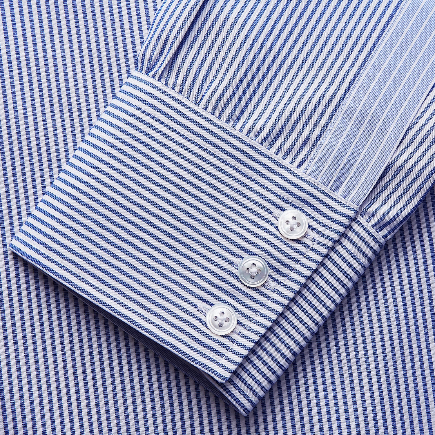 View 2 of product The Turnbull & Asser Blue and White Stripe Cotton RE-PURPOSE Mayfair Shirt, made with recycled fabrics, features long sleeves and a classic collar, and is shown flat against a white background.