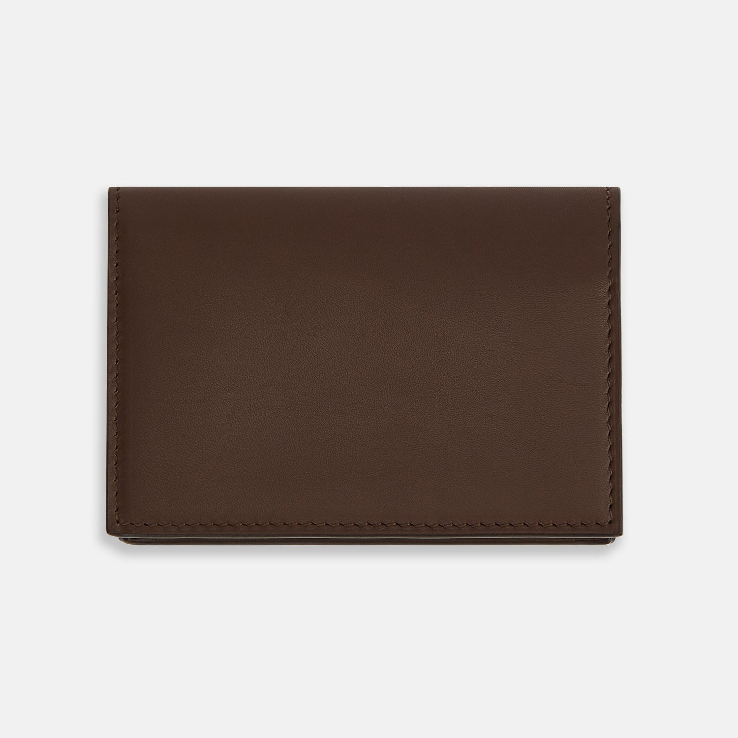 View 3 of product The Dark Brown Leather Bi-Fold Card Holder by Turnbull & Asser features neat edge stitching and the brand's name embossed in white on the front.